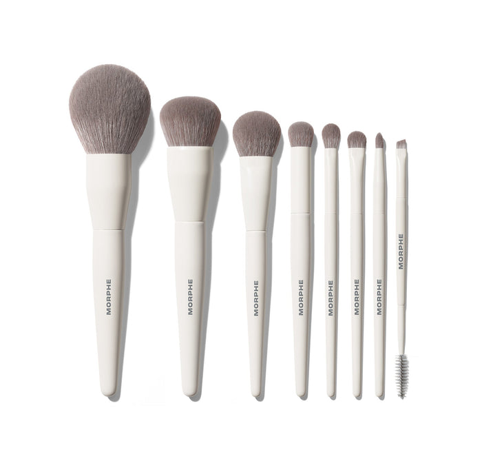 Morphe Best Of Blends 8 Piece Face Eye Brush Set with cream handles labeled "MORPHE," gray bristles in descending sizes, including a spoolie.