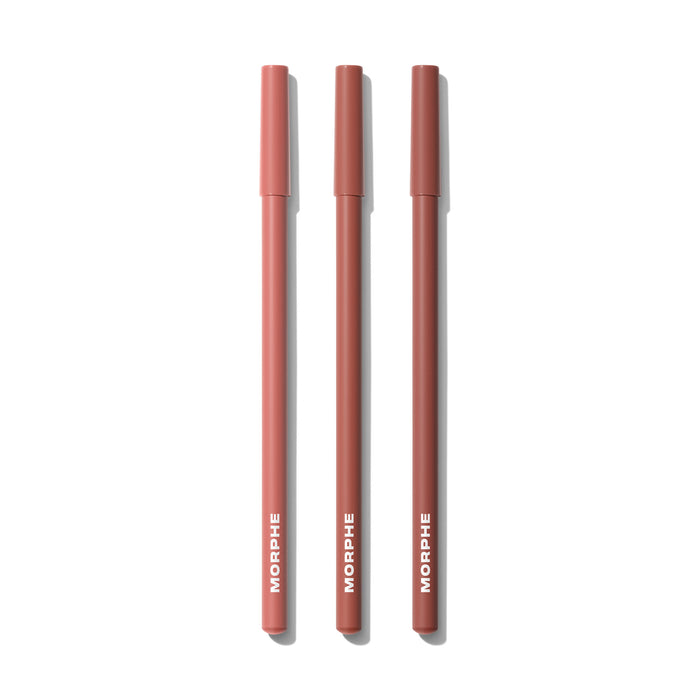 Three capped Morphe lip pencils in a warm medium nude-rose shade, each printed with "MORPHE," from the Best Selling Signature Lip Bundle Medium.