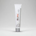 A tube of Biluma depigmenting and skin lightening cream with white and red text on a plain background.
