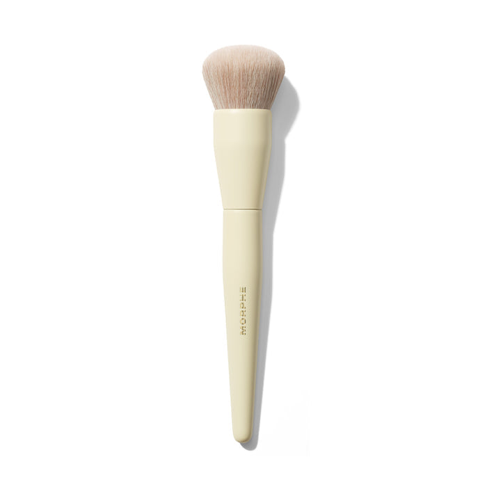 Morphe Buttery Blends M104 Domed Foundation Brush with cream handle and dense rounded bristles, MORPHE printed on handle.