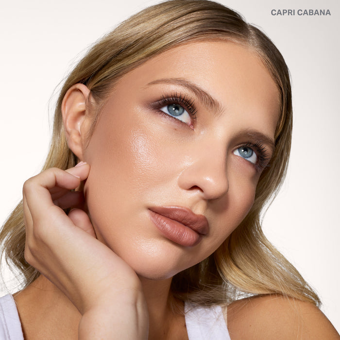 {Capri Cabana} Cheek Thrills Bronze Tone Duos on-figure model wearing shade CAPRI CABANA with a sun-kissed bronze glow.