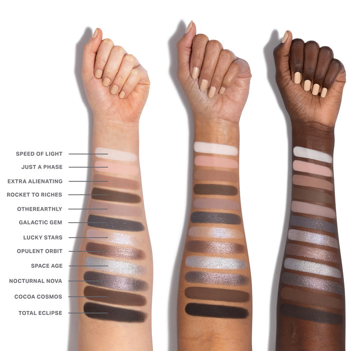 {Moon Stone} Chromaplus 12 Pan Eyeshadow Palette swatches on three skin tones: Speed of Light, Just a Phase, Extra Alienating, Rocket to Riches, Otherearthly, Galactic Gem, Lucky Stars, Opulent Orbit, Space Age, Nocturnal Nova, Cocoa Cosmos, Total Eclipse.