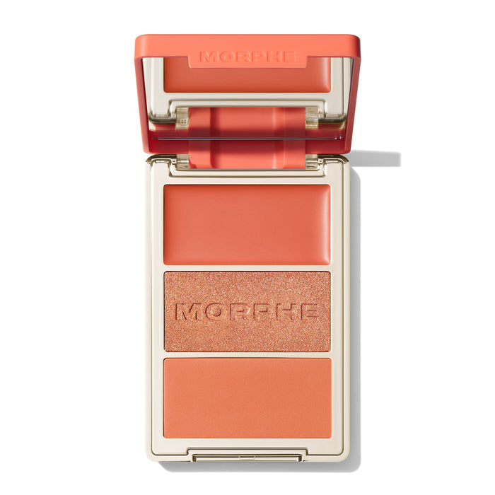{Poolside Spritz} Open Morphe Cheek Thrills Multi-Finish Face Trio with coral lid, coral cream, peach shimmer with MORPHE engraved, coral matte.