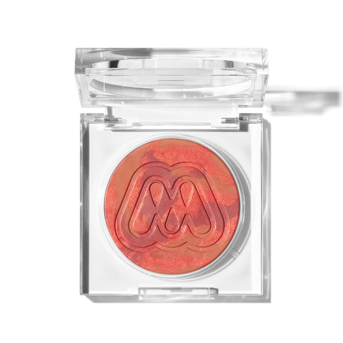 {Twist} Morphe Cloudlight Soft Glow Diffused Blush closed compact in a coral marbled shade in clear packaging with embossed M logo