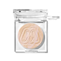 {Dawn} Open clear compact of Morphe Cloudlight Soft Glow Veil in a peach-beige shimmer powder with embossed M logo and silver metal hinge.