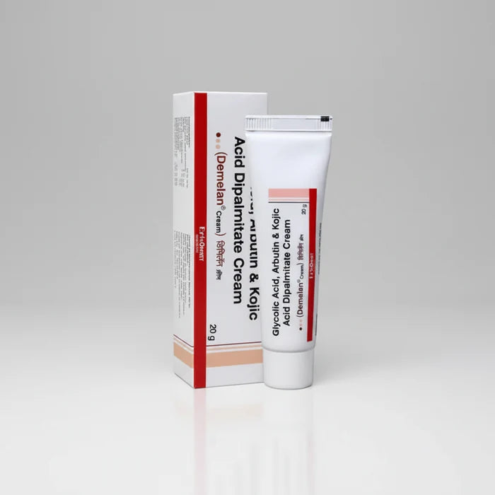 A white tube of Demetlan Cream Acid Dipalmitate Cream with a red stripe, standing next to its matching white and red packaging box on a light gray reflective surface.