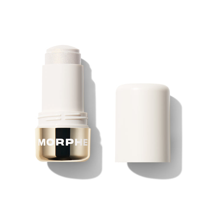 {Over Ice} Morphe Dreamlight Gelee Highlighter Stick in Over Ice, open stick beside cap showing icy pearl shimmer bullet with gold MORPHE band.