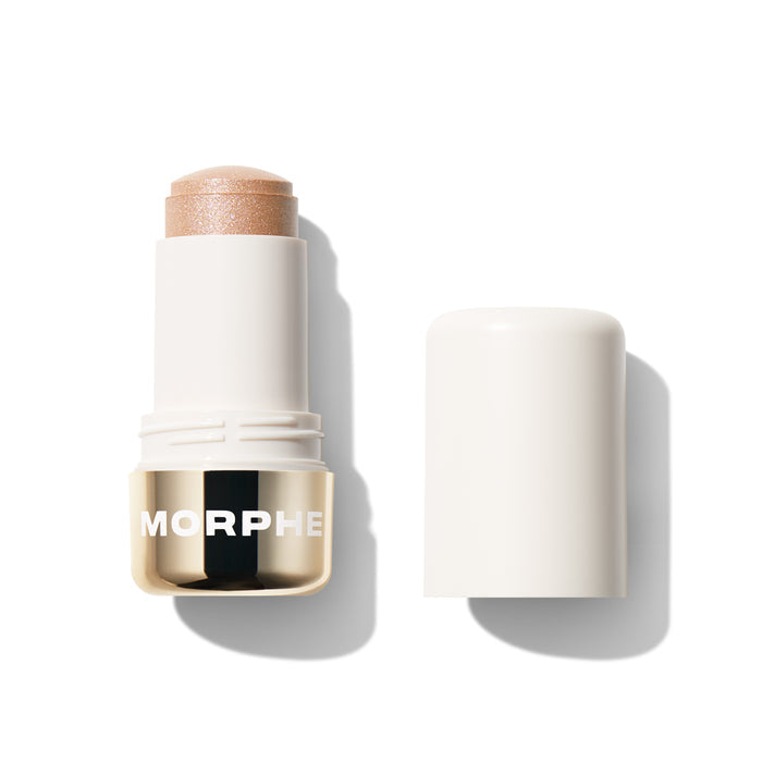 {Star Quality} MORPHE Dreamlight Gelee Highlighter Stick open silo showing a warm champagne-gold shimmer bullet with cap beside it.