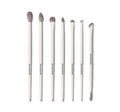 Eye Want It All 7 Piece Eye Brush Set featuring seven white-handled MORPHE brushes with gray bristles, ranging from large dome to angled liner and dual-ended spoolie.