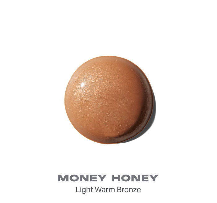 {Money Honey} Morphe Hot Shot Sun Drops bronzer smear in shade MONEY HONEY — Light Warm Bronze, a shimmery gold-bronze sphere-shaped drop.