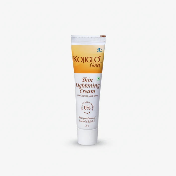 A 30g squeeze tube of Kojiglo Gold Skin Lightening Cream, featuring a white and orange label with brown text, set against a plain white background.