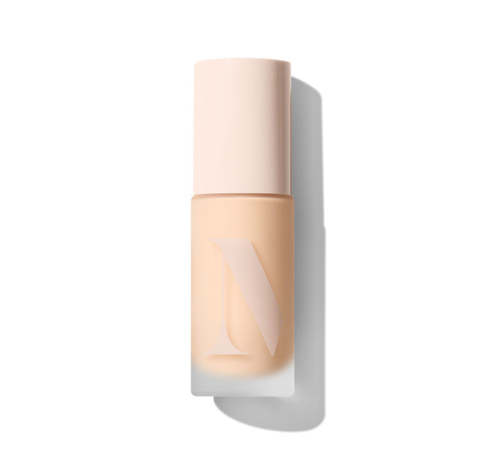 {Light 02N} Lightform Extended Hydration Foundation in a cream-capped frosted bottle with warm beige tint and embossed Morphe M logo.
