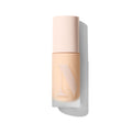 {Light 02N} Lightform Extended Hydration Foundation in a cream-capped frosted bottle with warm beige tint and embossed Morphe M logo.