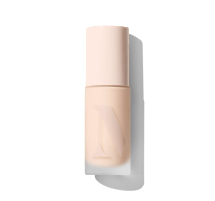 {Light 01N} Lightform Extended Hydration Foundation closed pump bottle in pale cream with embossed Morphe logo on the body.