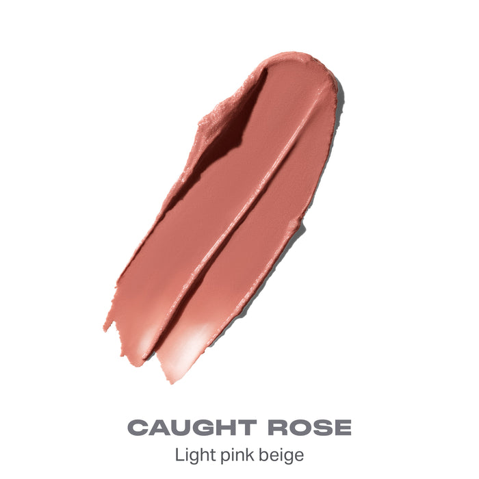 {Caught Rose} Liplock Glossy Lipstick shade swatch in CAUGHT ROSE — Light pink beige.