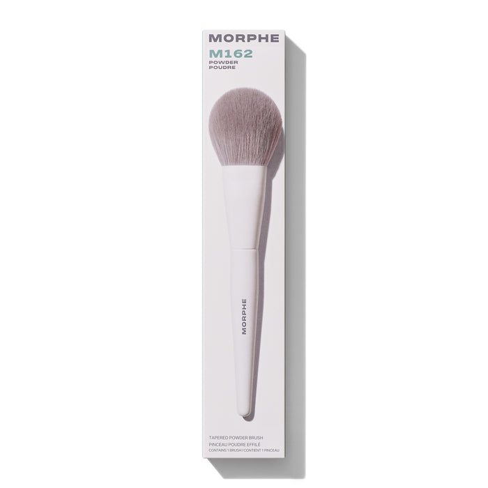 M162 Tapered Powder Brush in white retail box. Embedded text: "MORPHE M162 POWDER POUDRE TAPERED POWDER BRUSH PINCEAU POUDRE EFFILE CONTAINS 1 BRUSH / CONTIENT 1 PINCEAU"
