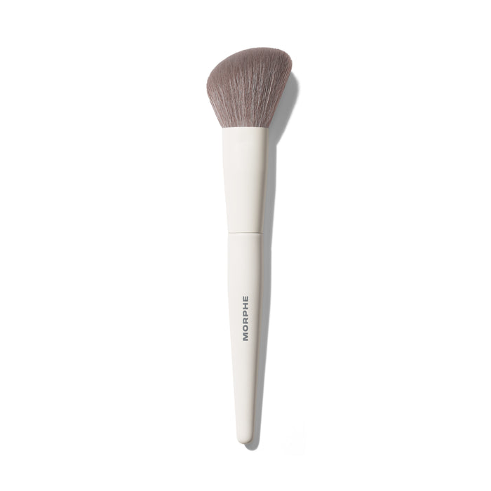 Morphe M241 Angled Powder Bronzer Brush with a white handle printed with MORPHE and a fluffy angled gray bristle head against a white background.