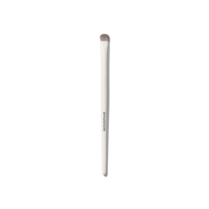 M302 Medium Paddle Packer Eyeshadow Brush with cream MORPHE handle and flat paddle bristles for packing shadow on the lid.