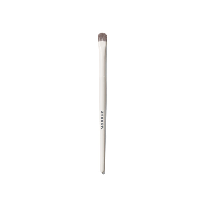 M303 Large Paddle Packer Eyeshadow Brush with cream MORPHE handle and wide flat bristles for packing shadow across the lid.