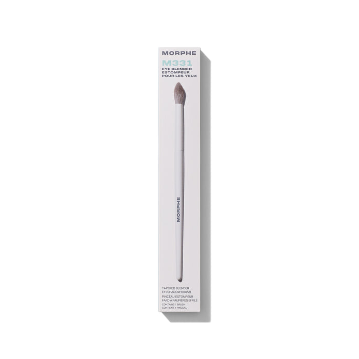 M331 Tapered Blender Eyeshadow Brush shown beside its cream MORPHE retail box for crease and blend application.