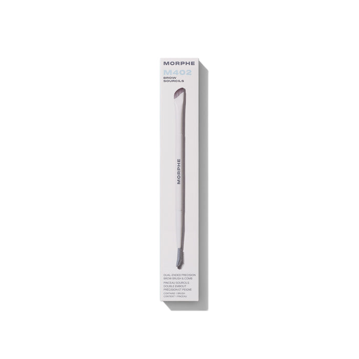 M402 Dual-Ended Precision Brow Brush & Comb shown beside its cream MORPHE box with brush and comb ends extending out.