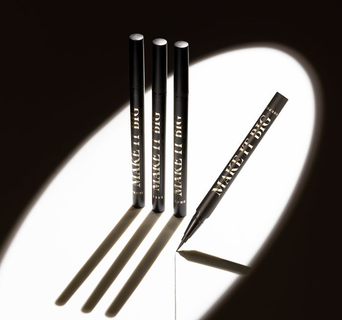 Four Morphe Make It Big Brush-Tip Liquid Liner pens with silver caps and gold MAKE IT BIG text in dramatic light.