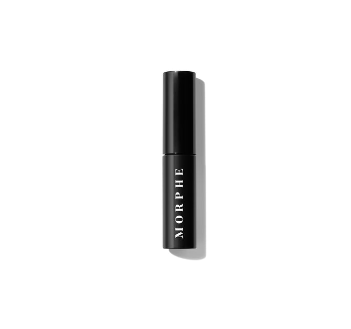 Morphe Make It Big Mini Volumizing Mascara closed black tube with vertical white MORPHE text on light background.
