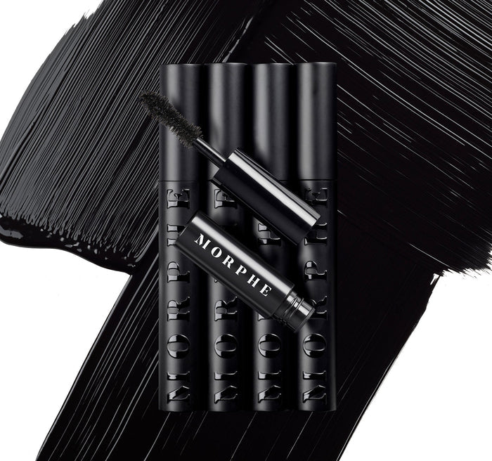 Morphe Make It Big Mini Volumizing Mascara group shot: black tubes engraved MORPHE arranged with wand and dark mascara swatches behind.