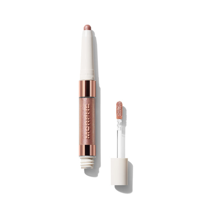 {Infamous/Anonymous} Morphe Dazzling Metallics Mixed Signals Dual Ended Cream Liquid Shadow Stick open silo showing rose gold glitter stick and liquid wand applicator.