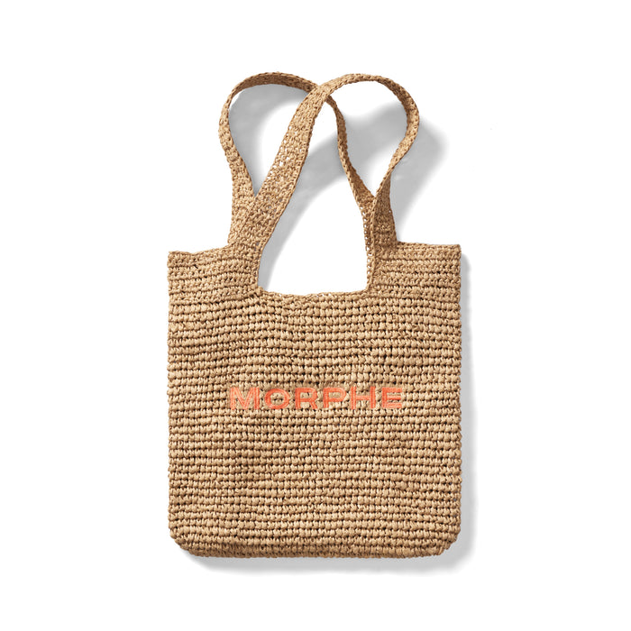 Morphe Raffia Tote Bag in Orange — woven natural raffia tote with orange embroidered MORPHE logo on the front.