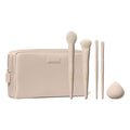 Morphe Iced Oat Latte Custom Blends 5-Piece Brush Set fanned out of beige makeup bag with eyeshadow swatch and beauty sponge