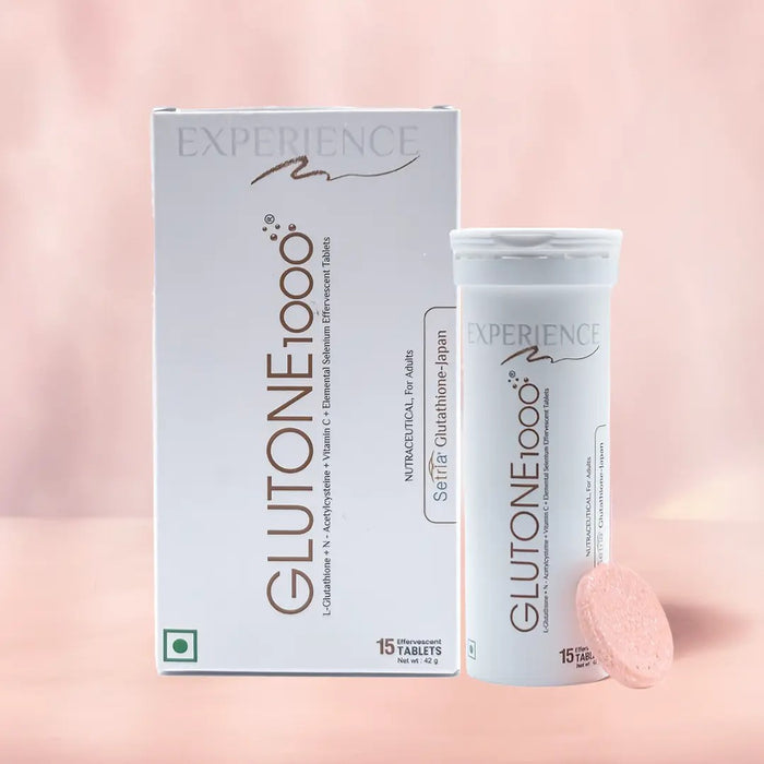 The image shows a box and a container of Glutone 1000 tablets, with a single tablet displayed in front. The background is plain and pink-toned.