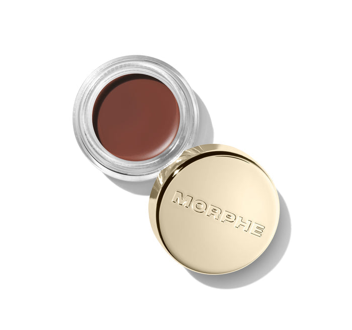 {Setlist} Morphe Solo Artist Priming Cream Eyeshadow in a warm brown-red shade, open clear jar beside gold lid embossed MORPHE.